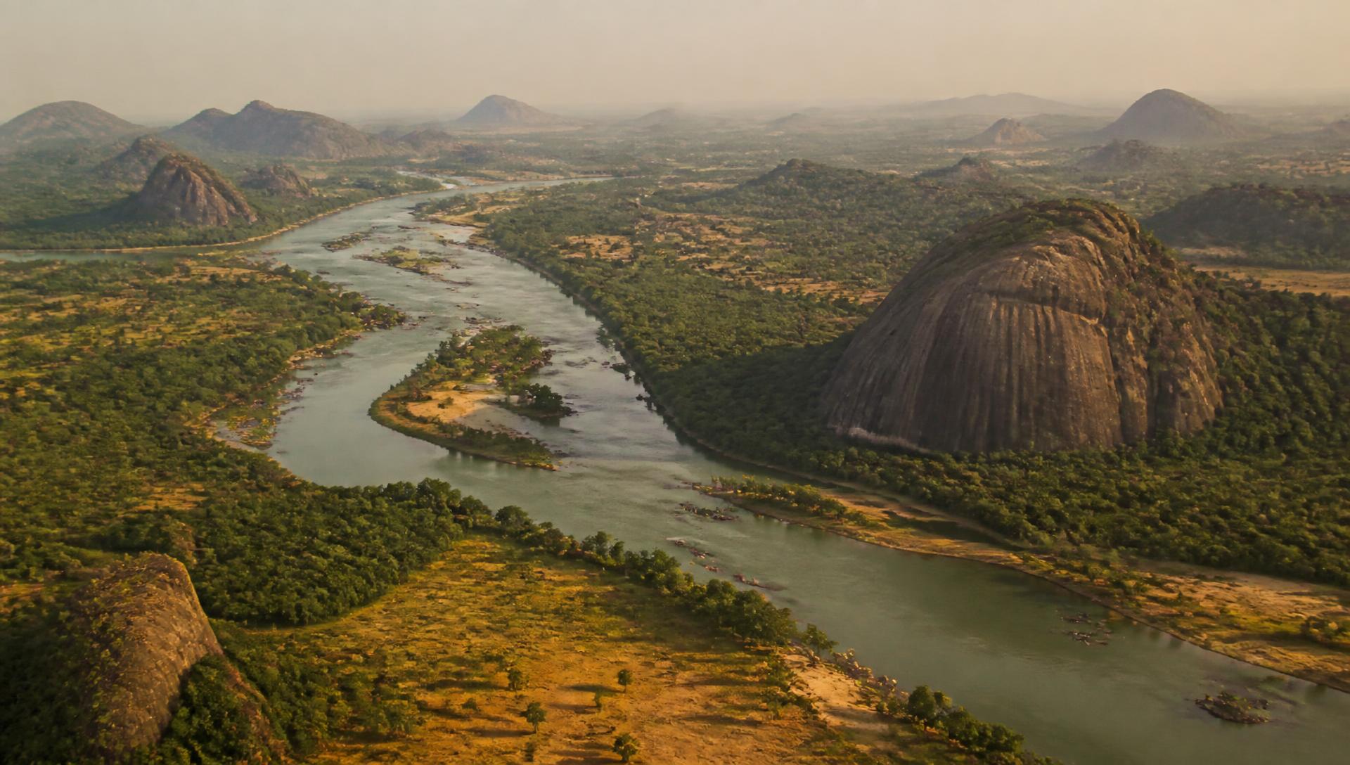 Aerial view of a river valley and granite outcrops in Taraba State